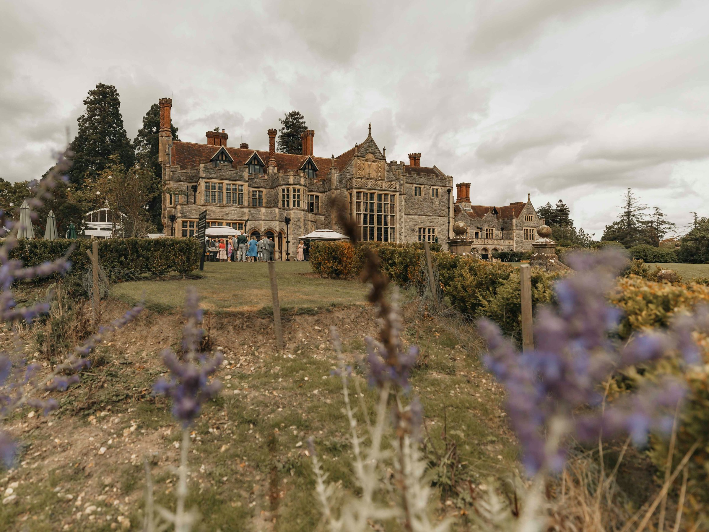 Guests arriving at a picturesque wedding venue, preparing for a beautiful wedding reception.